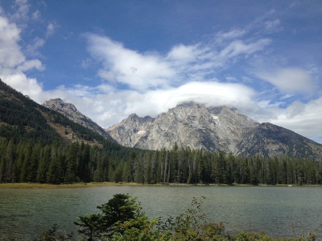 string lake with mount moran covered in clouds